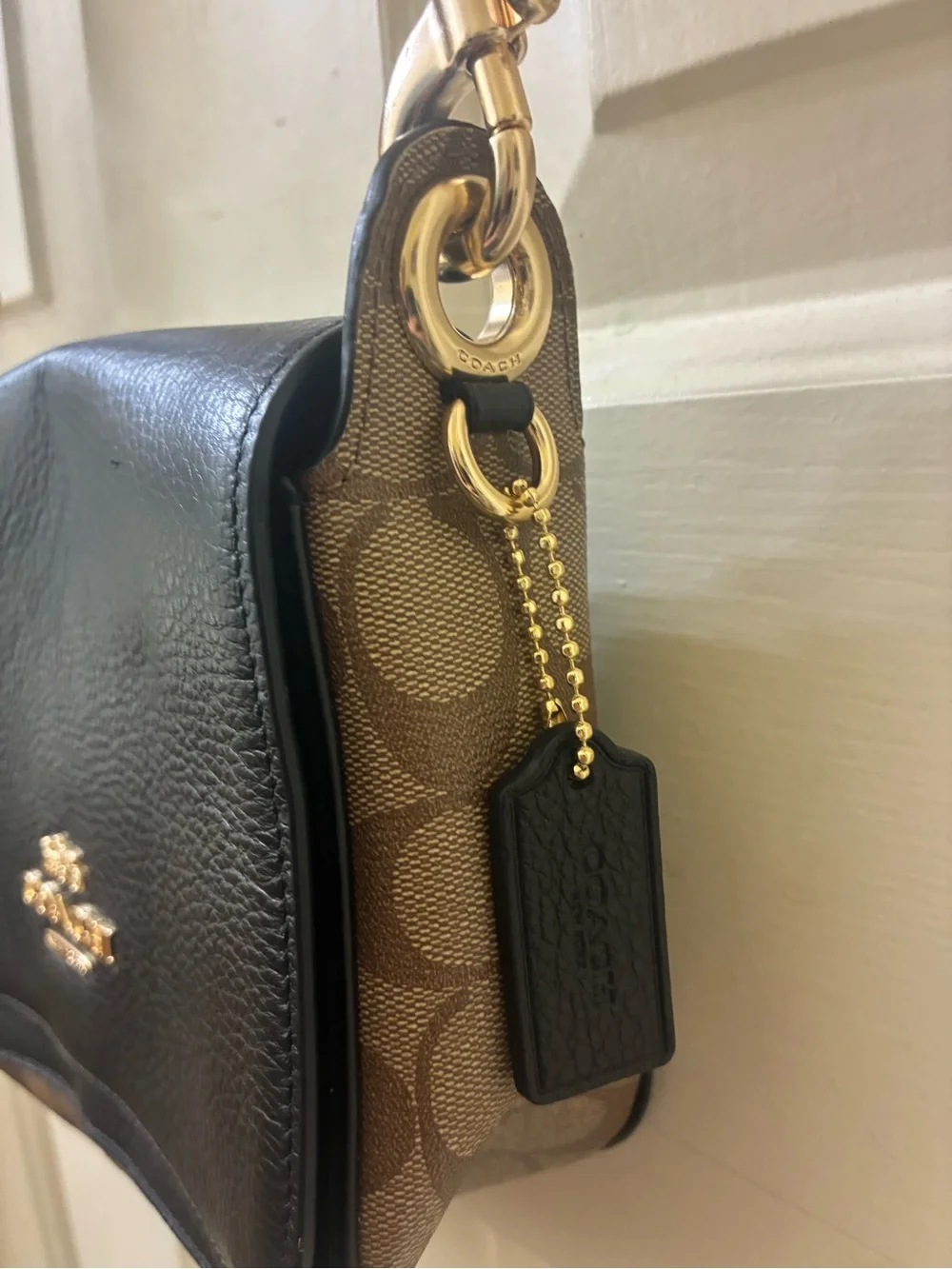 Coach Jet Messenger bag  black leather and monogrammed body NWOT